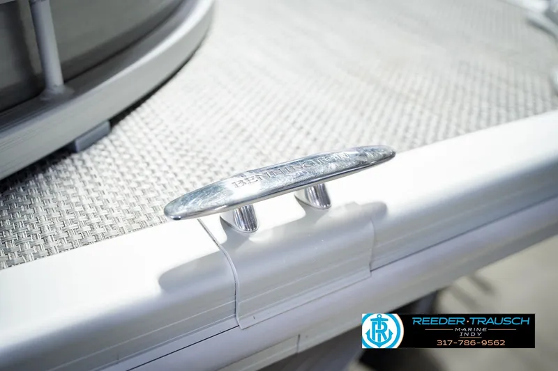 Slide: The Image of 2023 Bennington 23 LSR boat cleat detail with Reeder-Trausch Marine logo. - 67