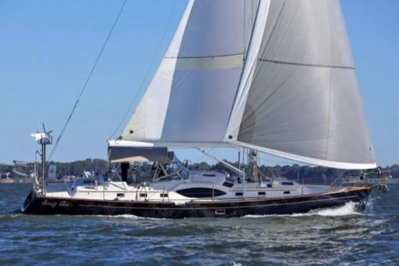 The Image of Sailing yacht Passport Vista 545 Center Cockpit, 2012 model, cruising on open water. - 0