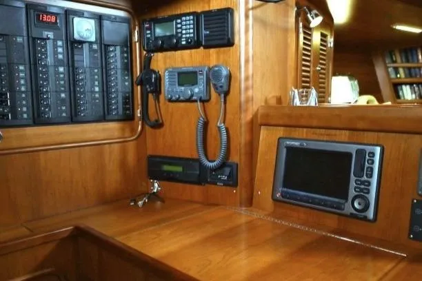 Slide: The Image of Control panel of 2012 Passport Vista 545 Center Cockpit yacht with navigation equipment. - 11