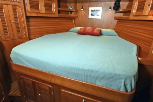 Slide: The Image of Luxurious cabin interior of 2012 Passport Vista 545 Center Cockpit yacht with cozy bed. - 14