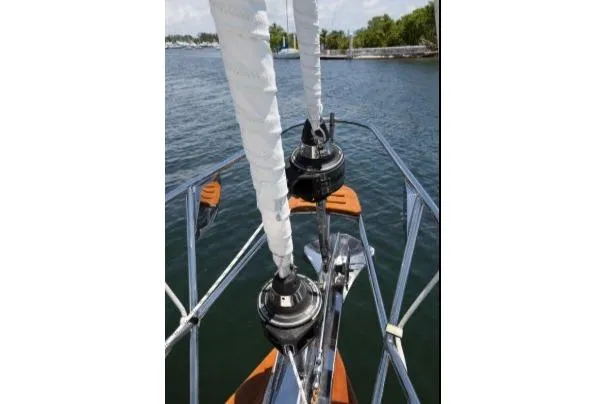 Slide: The Image of Sailboat deck view of 2012 Passport Vista 545 Center Cockpit on water. - 18