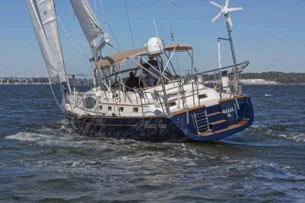 Slide: The Image of Sailing yacht Passport Vista 545 Center Cockpit, 2012 model, navigating open waters. - 21