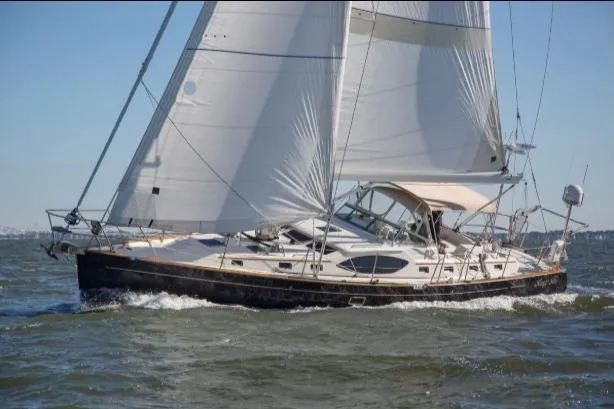 Slide: The Image of Sailing yacht Passport Vista 545 Center Cockpit, 2012 model, navigating open waters. - 23