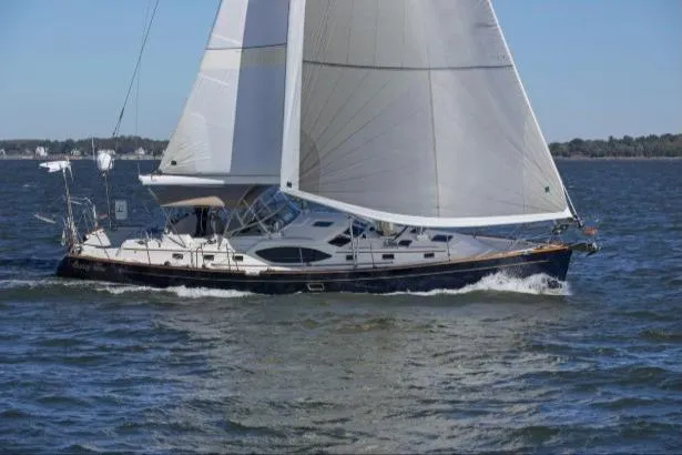 Slide: The Image of Sailing yacht Passport Vista 545 Center Cockpit, 2012 model, cruising on open water. - 24