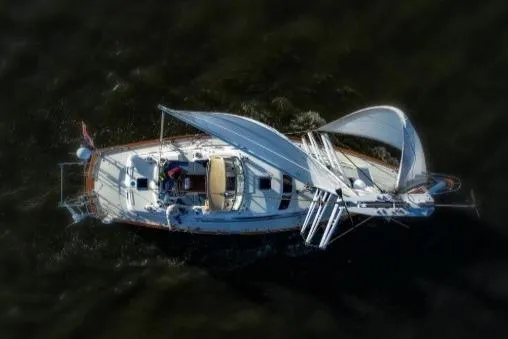 Slide: The Image of Aerial view of 2012 Passport Vista 545 Center Cockpit sailing on open water. - 25