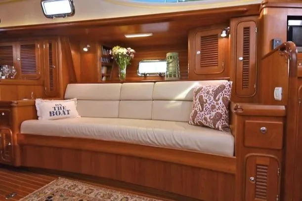Slide: The Image of Luxurious interior of 2012 Passport Vista 545 Center Cockpit with elegant wood finish and cozy seating. - 6