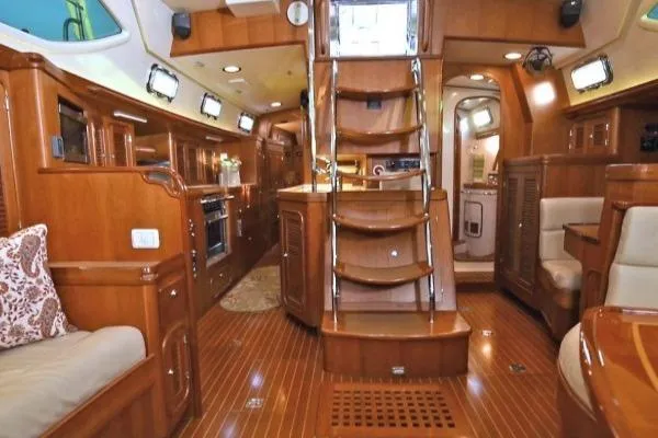 Slide: The Image of Luxurious interior of 2012 Passport Vista 545 Center Cockpit yacht with wooden finishes. - 9