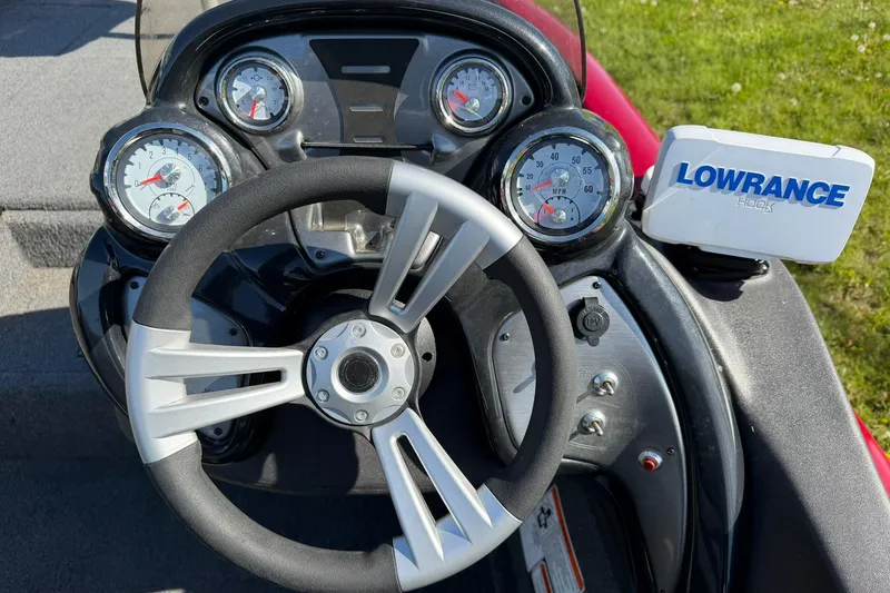 Slide: The Image of Steering console of 2024 Tracker Pro Team 175 TXW with Lowrance Hook display. - 10