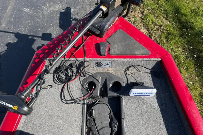 Slide: The Image of 2024 Tracker Pro Team 175 TXW boat deck with Minn Kota trolling motor and Lowrance fish finder. - 11