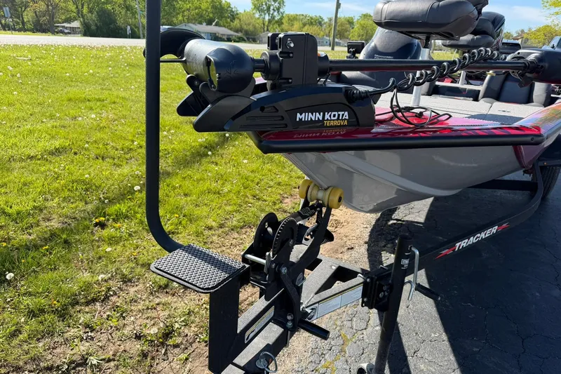 Slide: The Image of 2024 Tracker Pro Team 175 TXW boat with Minn Kota Terrova motor on trailer. - 17