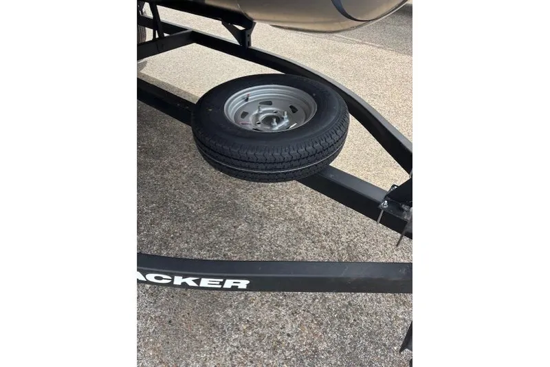 Slide: The Image of Trailer with spare tire for 2026 Sun Tracker Party Barge 16 DLX. - 15