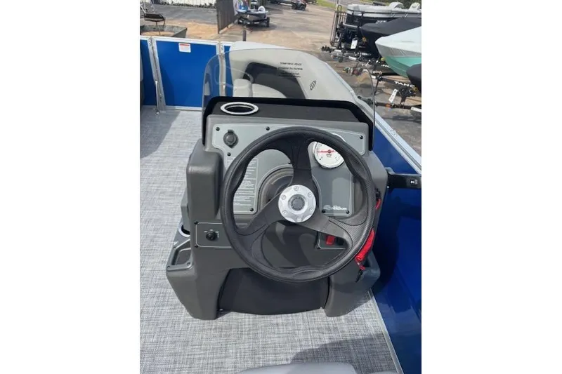 Slide: The Image of Steering console of 2026 Sun Tracker Party Barge 16 DLX pontoon boat. - 9