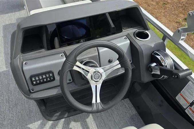 Slide: The Image of Steering console of 2026 Sun Tracker Fishin' Barge 22 DLX pontoon boat. - 5