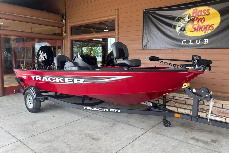 Slide: The Image of 2026 Tracker Super Guide V-16 SC boat displayed at Bass Pro Shops Club. - 3