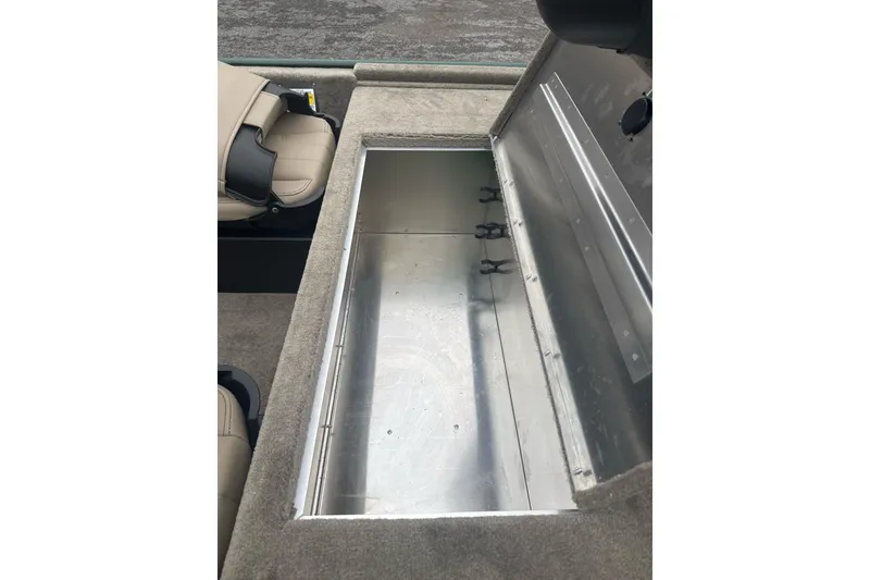 Slide: The Image of Storage compartment in 2026 Tracker Bass Tracker Classic Limited boat. - 8