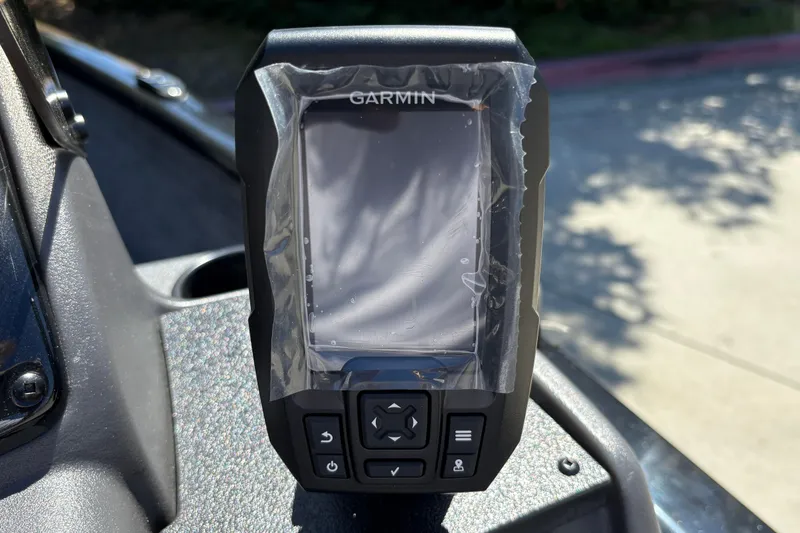 Slide: The Image of Garmin device on 2026 Tracker Super Guide V-16 SC boat dashboard, sunlight reflection. - 21