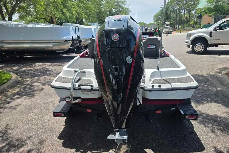 Slide: The Image of 2026 Nitro Z19 XL boat on trailer, parked outdoors. - 6