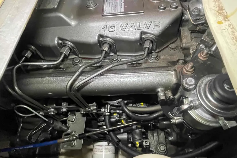 Slide: The Image of Engine of a 2013 Catalina Morgan 440, featuring a 16-valve configuration. - 32