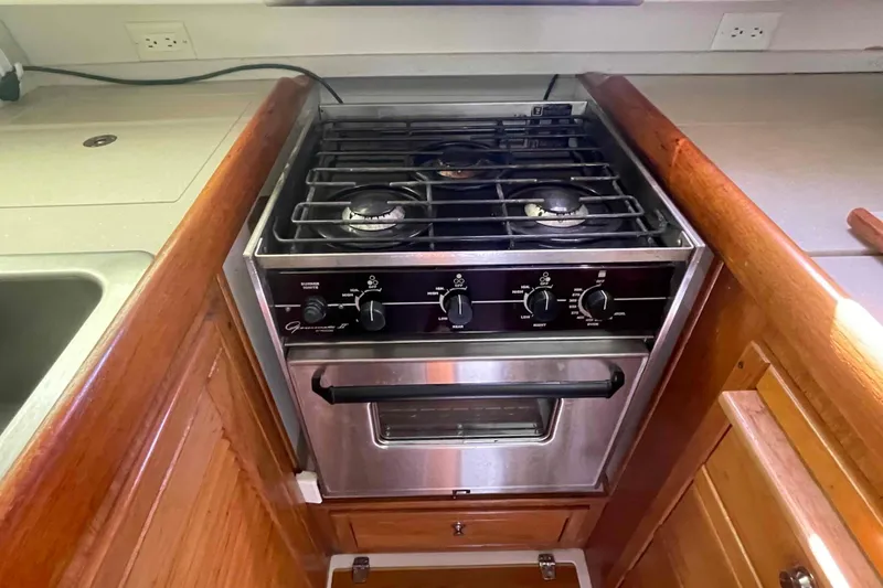 Slide: The Image of Stainless steel stove and oven in 2013 Catalina Morgan 440 yacht kitchen. - 36