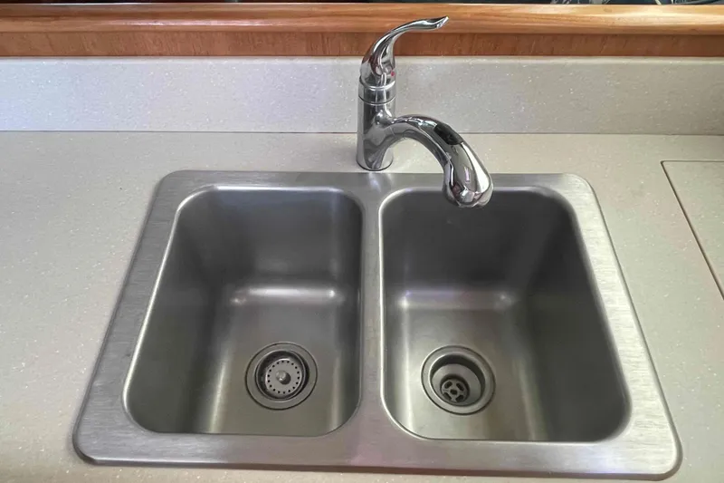 Slide: The Image of Stainless steel double sink with chrome faucet on Catalina Morgan 440 yacht, 2013 model. - 40