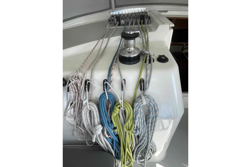 Slide: The Image of Sailing ropes and winch on a 2013 Catalina Morgan 440 yacht deck. - 45