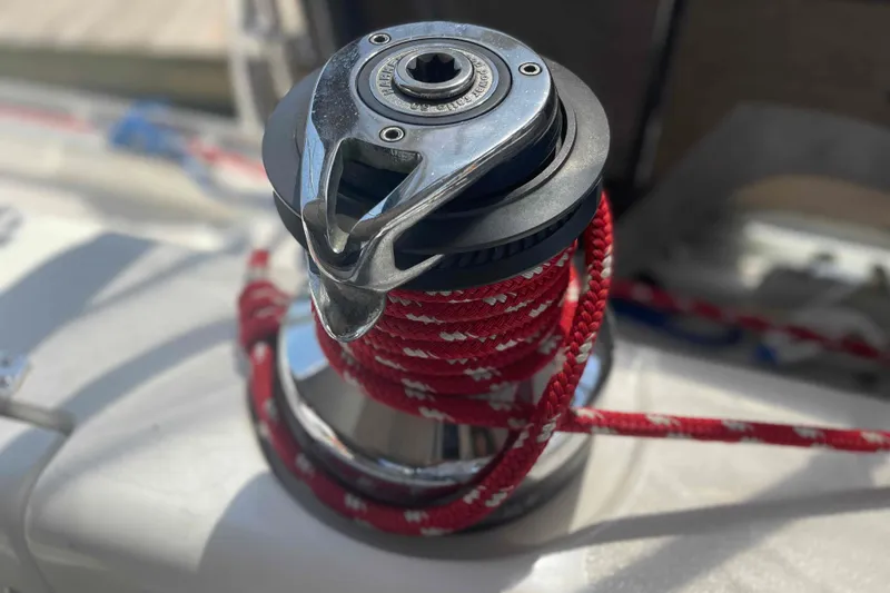 Slide: The Image of Winch with red rope on 2013 Catalina Morgan 440 sailboat deck. - 53