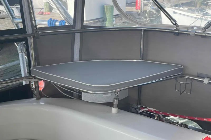 Slide: The Image of Cockpit table on a 2013 Catalina Morgan 440 sailboat, featuring a sleek design. - 58
