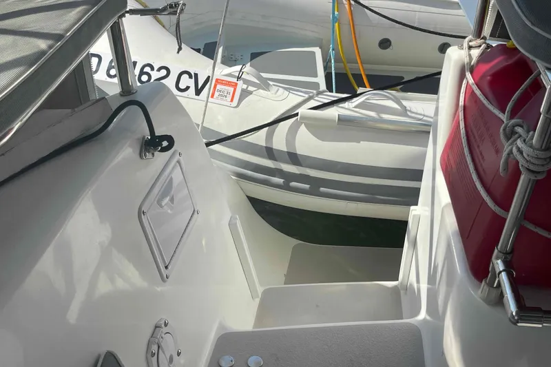 Slide: The Image of Catalina Morgan 440 yacht deck with dinghy and fuel container, 2013 model. - 60