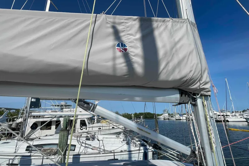 Slide: The Image of Sailboat mast and boom of 2013 Catalina Morgan 440 in marina setting. - 72