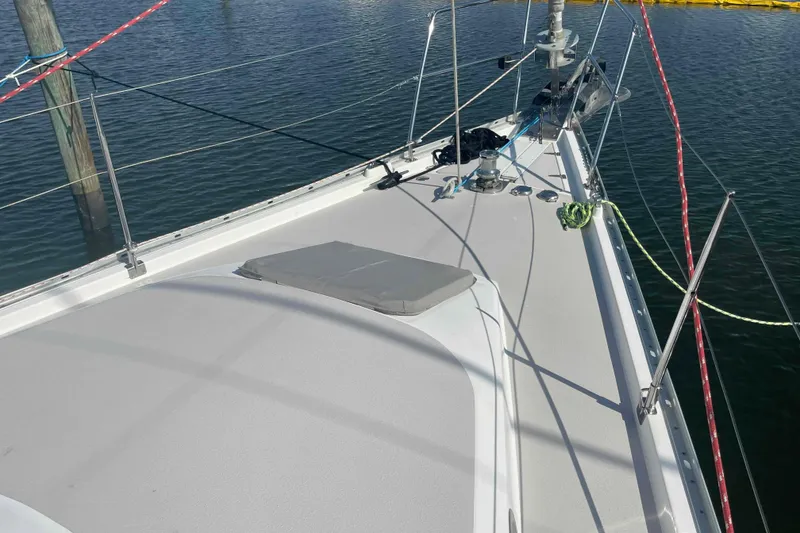 Slide: The Image of Deck view of 2013 Catalina Morgan 440 sailboat in marina. - 74