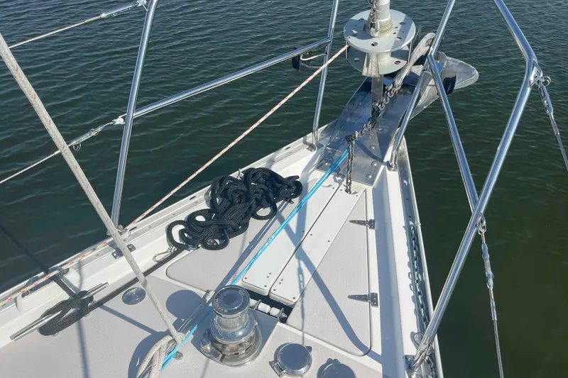 Slide: The Image of Bow of 2013 Catalina Morgan 440 sailboat with anchor and ropes. - 75