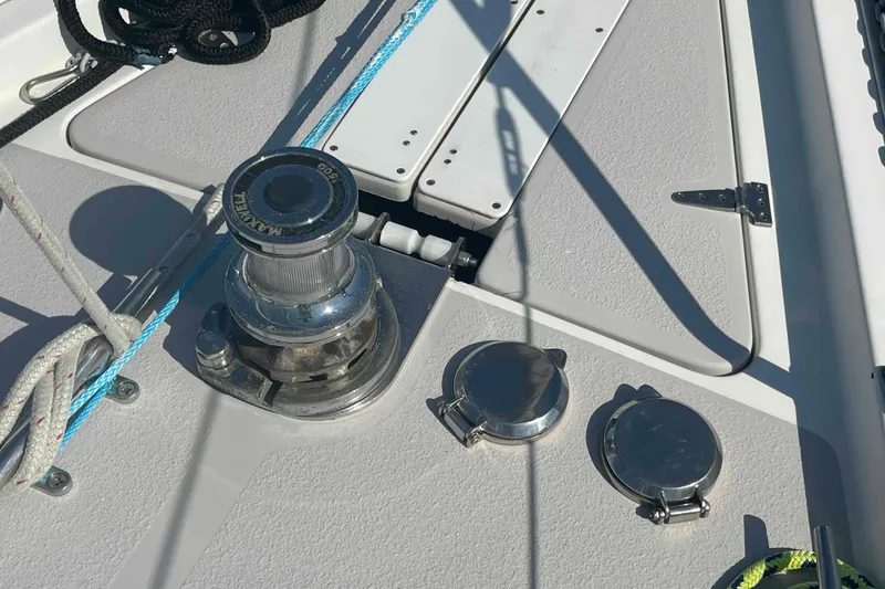 Slide: The Image of Deck of 2013 Catalina Morgan 440 sailboat with winch and ropes. - 77