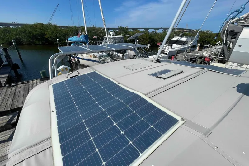 Slide: The Image of Catalina Morgan 440 sailboat with solar panels docked at marina, 2013 model. - 83