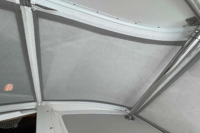 Slide: The Image of Interior view of a 2013 Catalina Morgan 440 sailboat canopy with metal supports. - 91