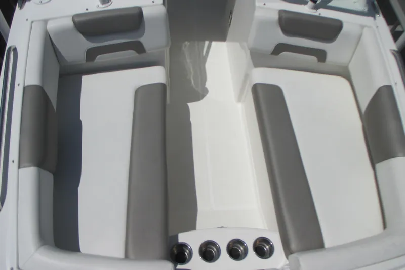 Slide: The Image of 2020 World Cat 230 SD boat interior with seating and steering console. - 11