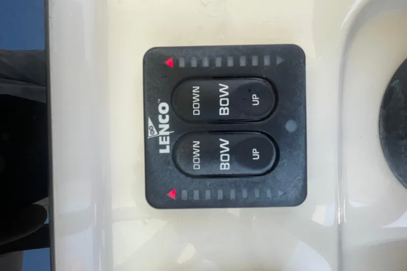 Slide: The Image of Lenco control panel on 2023 Scout 305 LXF boat. - 18