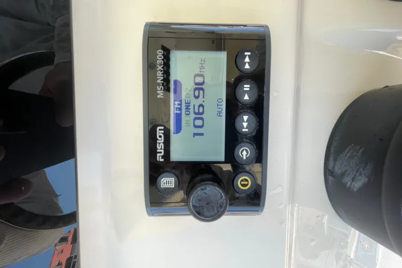 Slide: The Image of Fusion MS-NRX300 marine stereo display on 2023 Scout 305 LXF boat. - 19