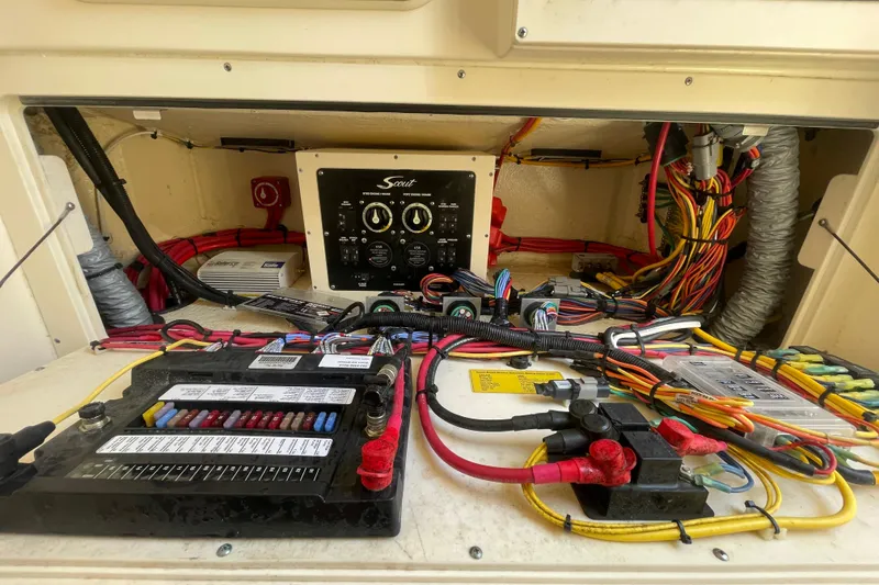 Slide: The Image of Electrical system of 2023 Scout 305 LXF boat, showcasing wiring and control panel. - 29