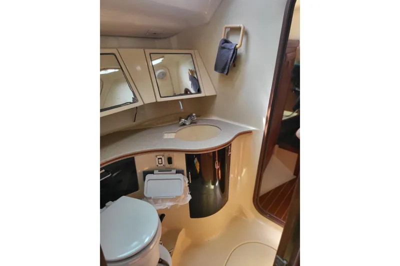 Slide: The Image of Interior of 1993 Hunter Legend 40.5 yacht bathroom with sink and toilet. - 10