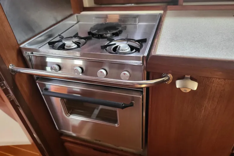 Slide: The Image of Stainless steel stove and oven in 1993 Hunter Legend 40.5 yacht kitchen. - 17