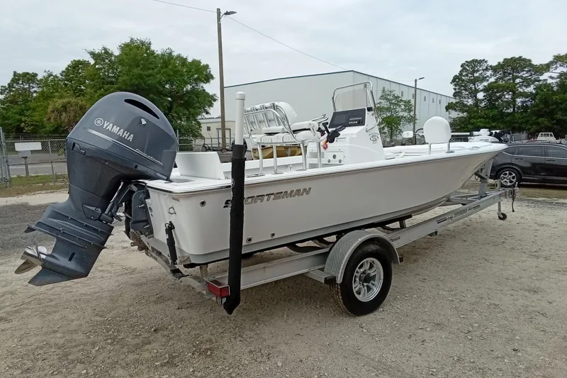 Slide: The Image of 2021 Sportsman Masters 207 Bay Boat on trailer with Yamaha outboard motor. - 15