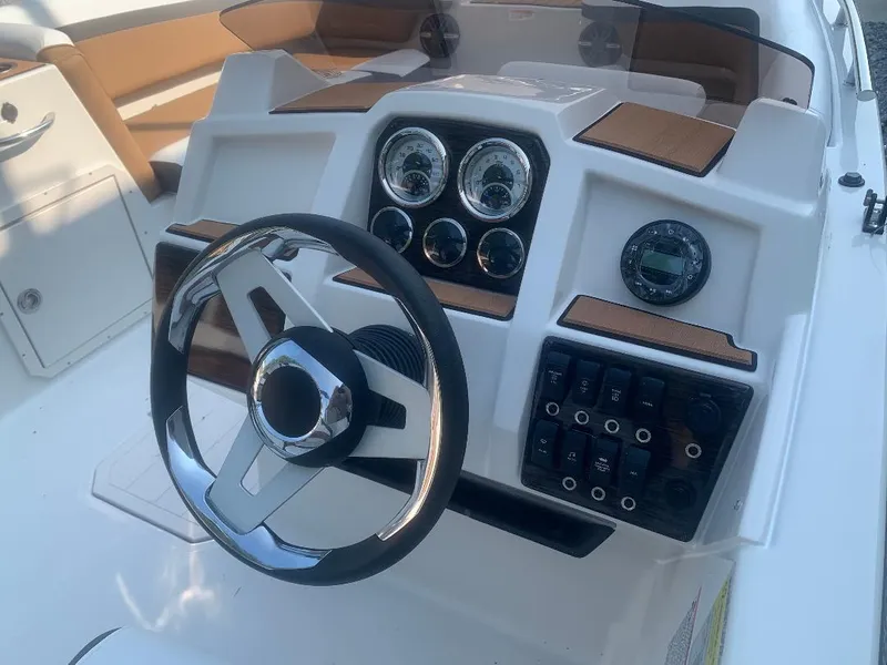 Slide: The Image of Dashboard of 2024 Starcraft SVX 191 OB with steering wheel and gauges. - 6