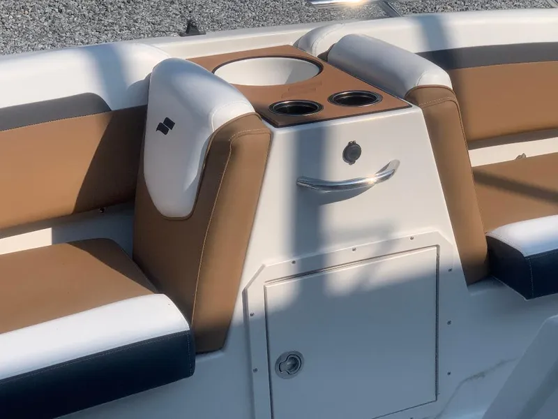 Slide: The Image of Interior of 2024 Starcraft SVX 191 OB with seating and cup holders. - 9