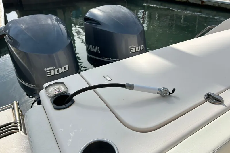 Slide: The Image of 2016 Grady-White Canyon 306 boat with Yamaha 300 engines at dock. - 12