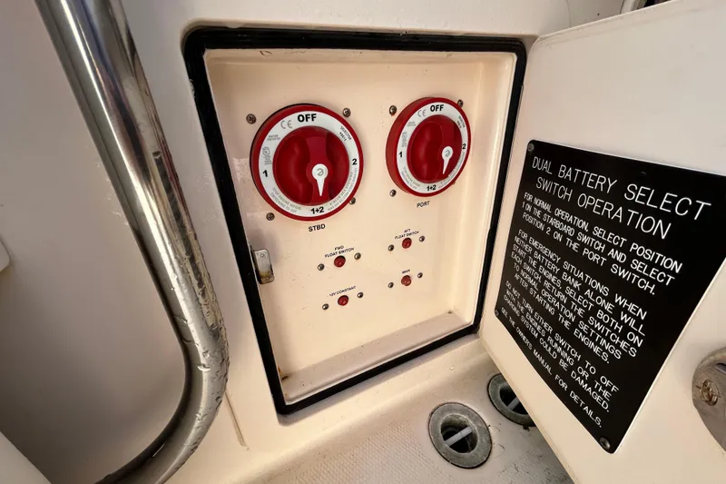 Slide: The Image of Dual battery switch panel on 2016 Grady-White Canyon 306 boat. - 16
