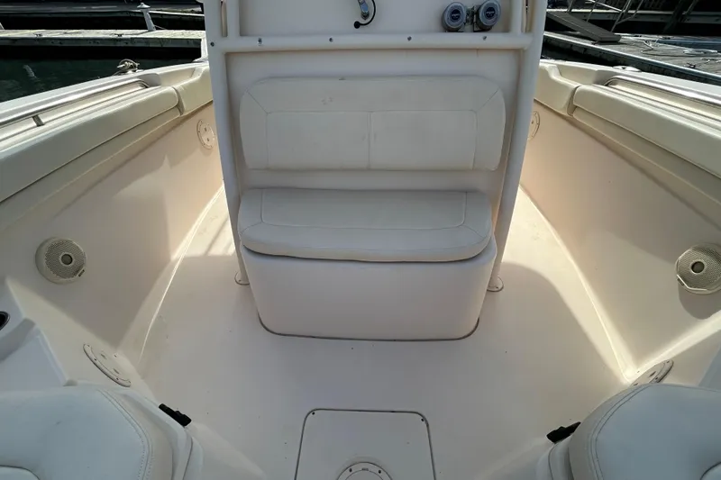 Slide: The Image of 2016 Grady-White Canyon 306 boat interior with seating and speakers. - 26