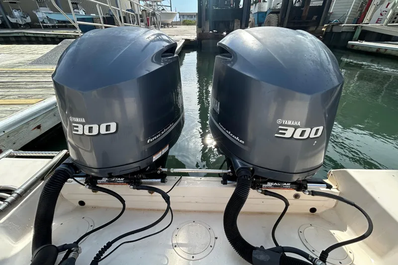 Slide: The Image of Twin Yamaha 300 outboard engines on a 2016 Grady-White Canyon 306 boat. - 9