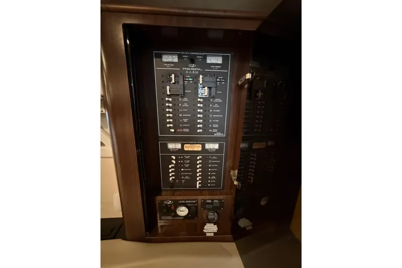 Slide: The Image of Electrical control panel of 2016 Regal 35 Sport Coupe boat. - 27