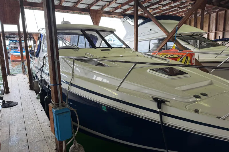 Slide: The Image of Manufacturer Provided Image: 2016 Regal 35 Sport Coupe boat interior layout with seating, kitchen, and sleeping areas. - 8