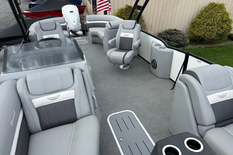 Slide: The Image of 2024 Bennington LX Sport Line boat interior with luxurious gray seating and modern design. - 17